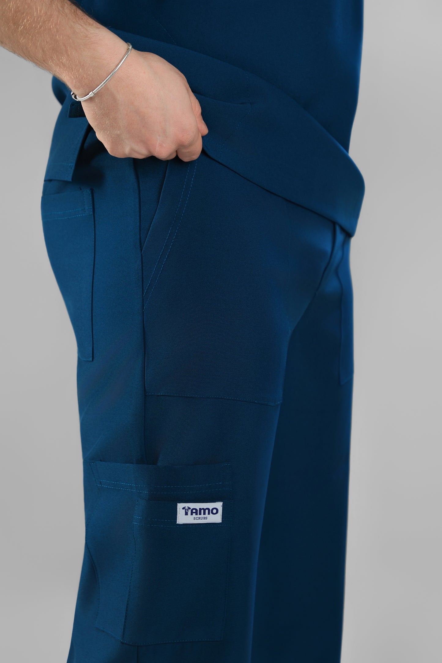 Petrol Blue Polo scrub design - care stretch fabric
